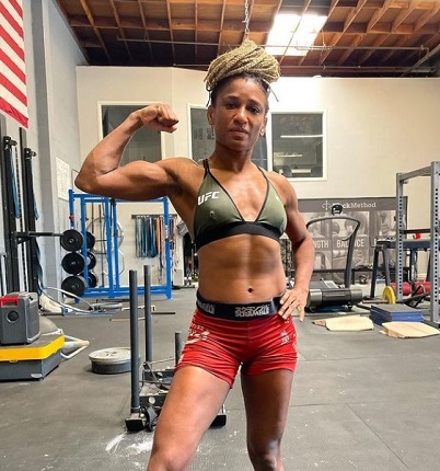 Angela Hill doing workout in Gym